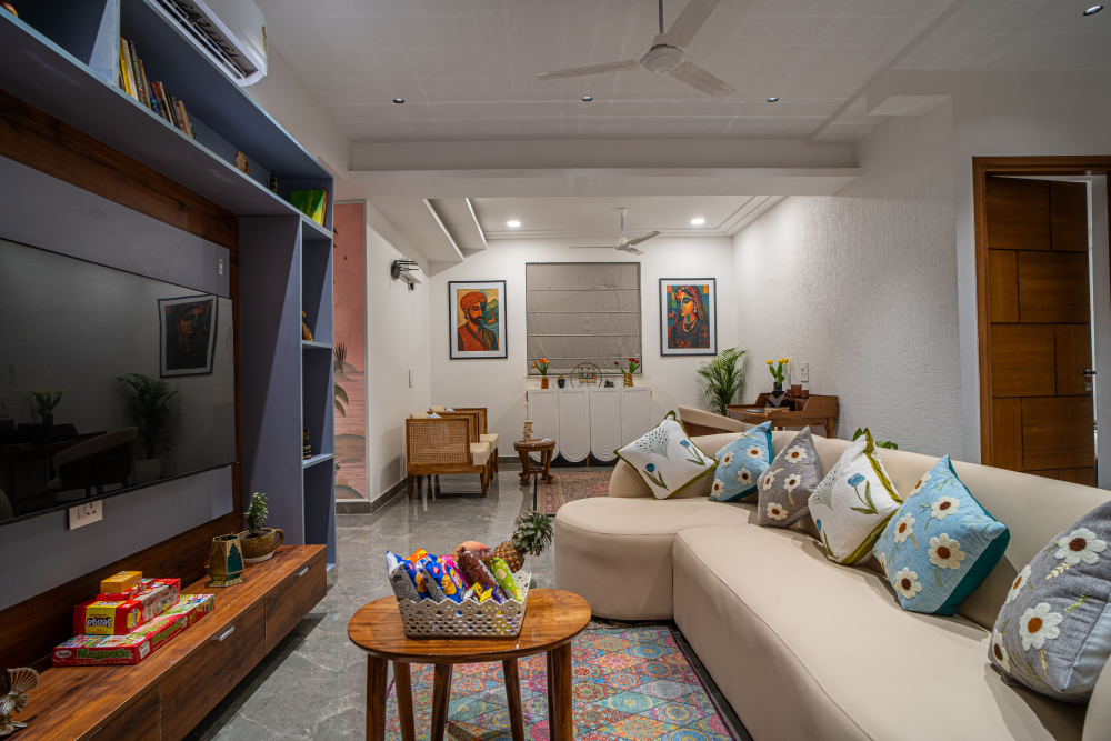 Luxury villa in Dehradun with sofa, light-colored aesthetic decor, paintings, and elegant interior design