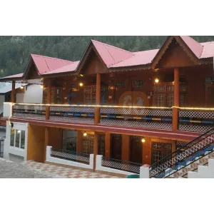 wooden entrance of hotel manisha in Gangotri