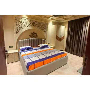 Deluxe room with double bed at Swami Jagannath Ashram in Rishikesh