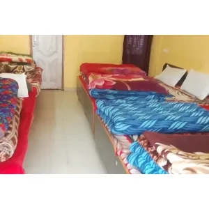 family room with four beds at Hotel Ganga Kinare Near Kedarnath Temple