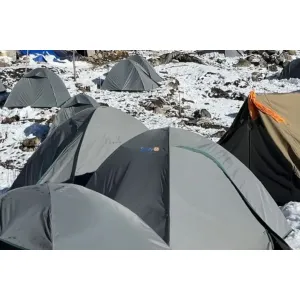 Tents with beautiful Himalayan views and snowfall on Kedarnath base